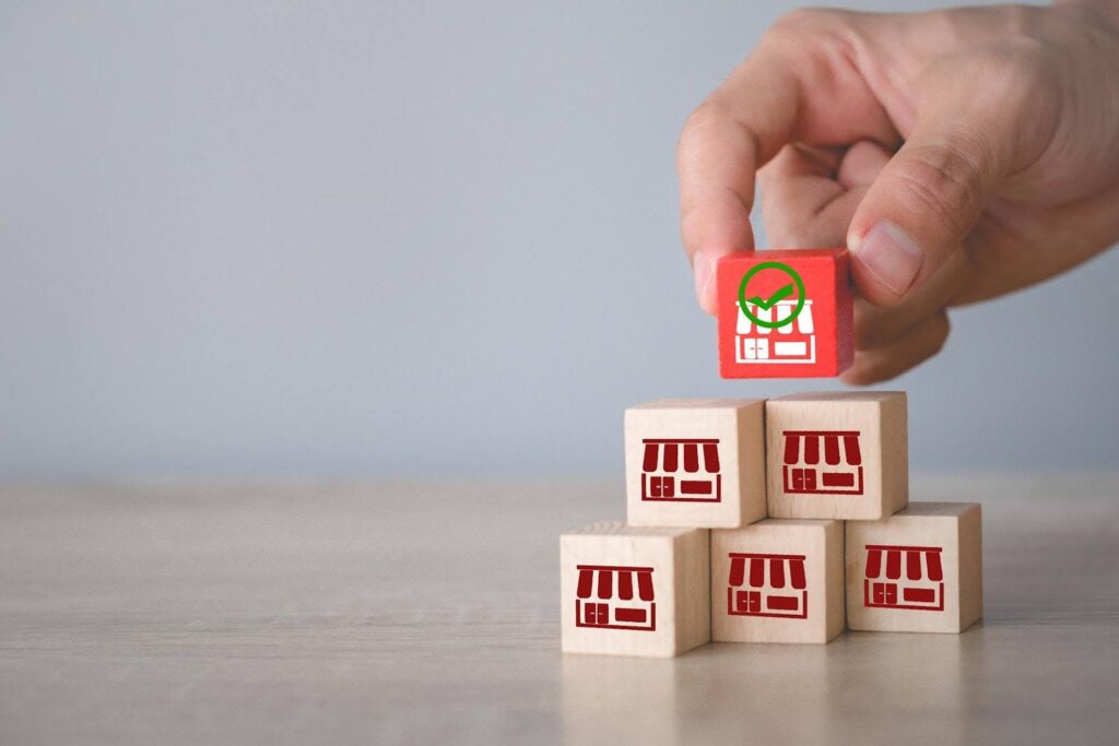 Ace Home Care Franchise comparing franchise vs independent home care agency ownership, illustrated by stacked business blocks representing different home care paths and growth options.