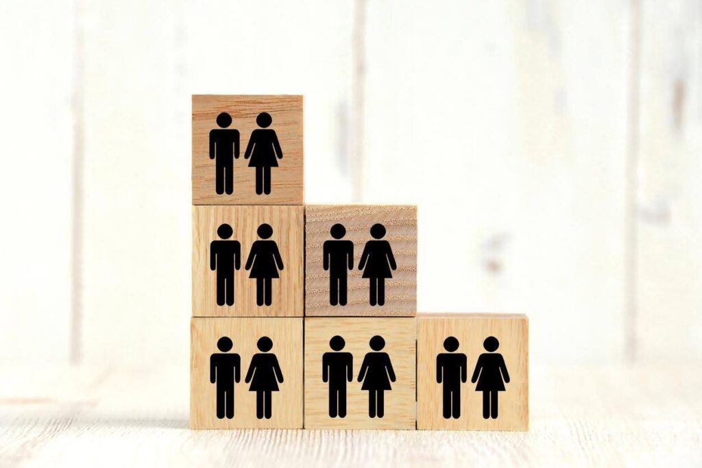Stacked wooden blocks representing the aging population and growing demand for care services by Ace Home Care Franchise