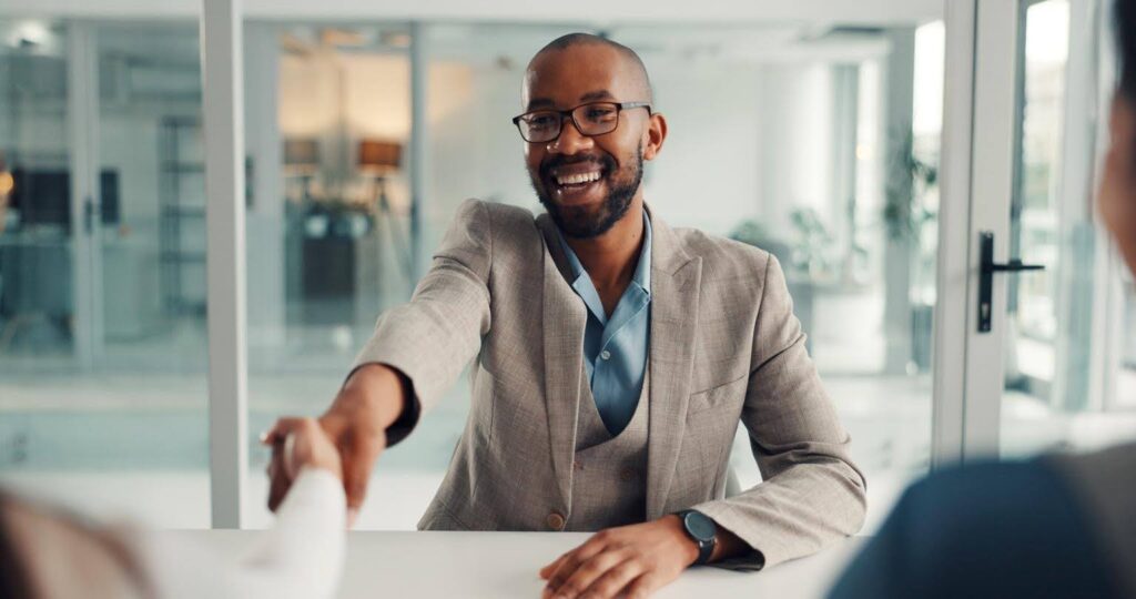 Investor asking important questions during a business meeting before choosing Ace Home Care Franchise