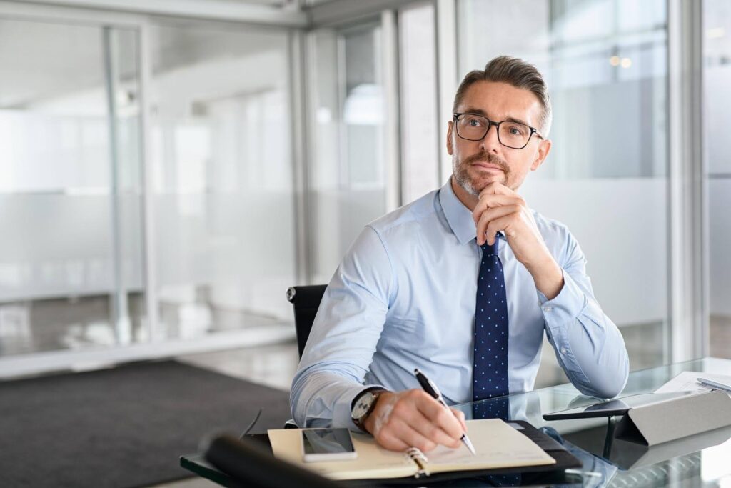 Professional business owner planning a home care franchise, demonstrating how Ace Home Care Franchise supports entrepreneurs with no medical background through training and guidance