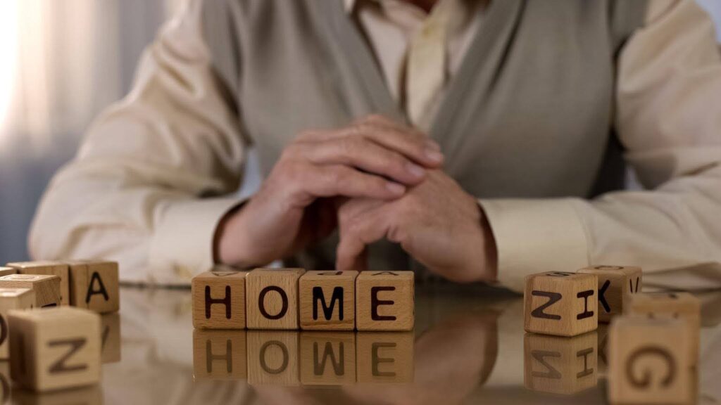 Wooden blocks spelling HOME, representing what makes Ace Home Care Franchise a different home care franchise opportunity focused on purpose, support, and community impact