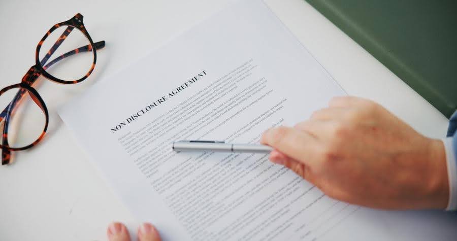 Business owner reviewing a Franchise Disclosure Document (FDD) before investing in an Ace Home Care Franchise, highlighting key information to understand without a lawyer.