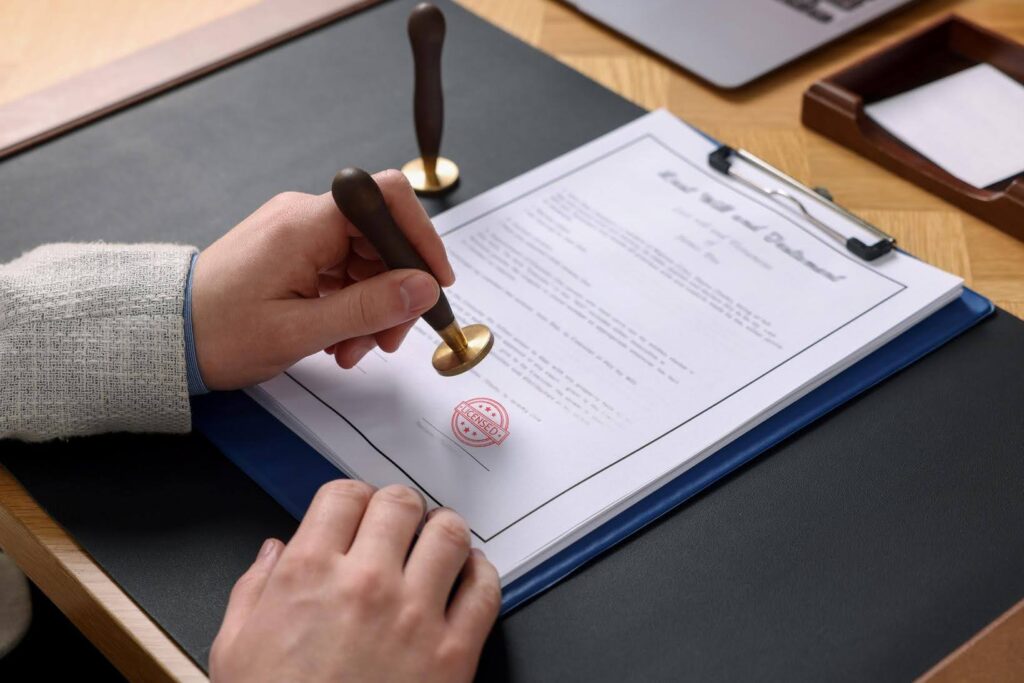 Official licensing documents being stamped during the franchise approval process, illustrating the state licensing timeline after purchasing an Ace Home Care Franchise.